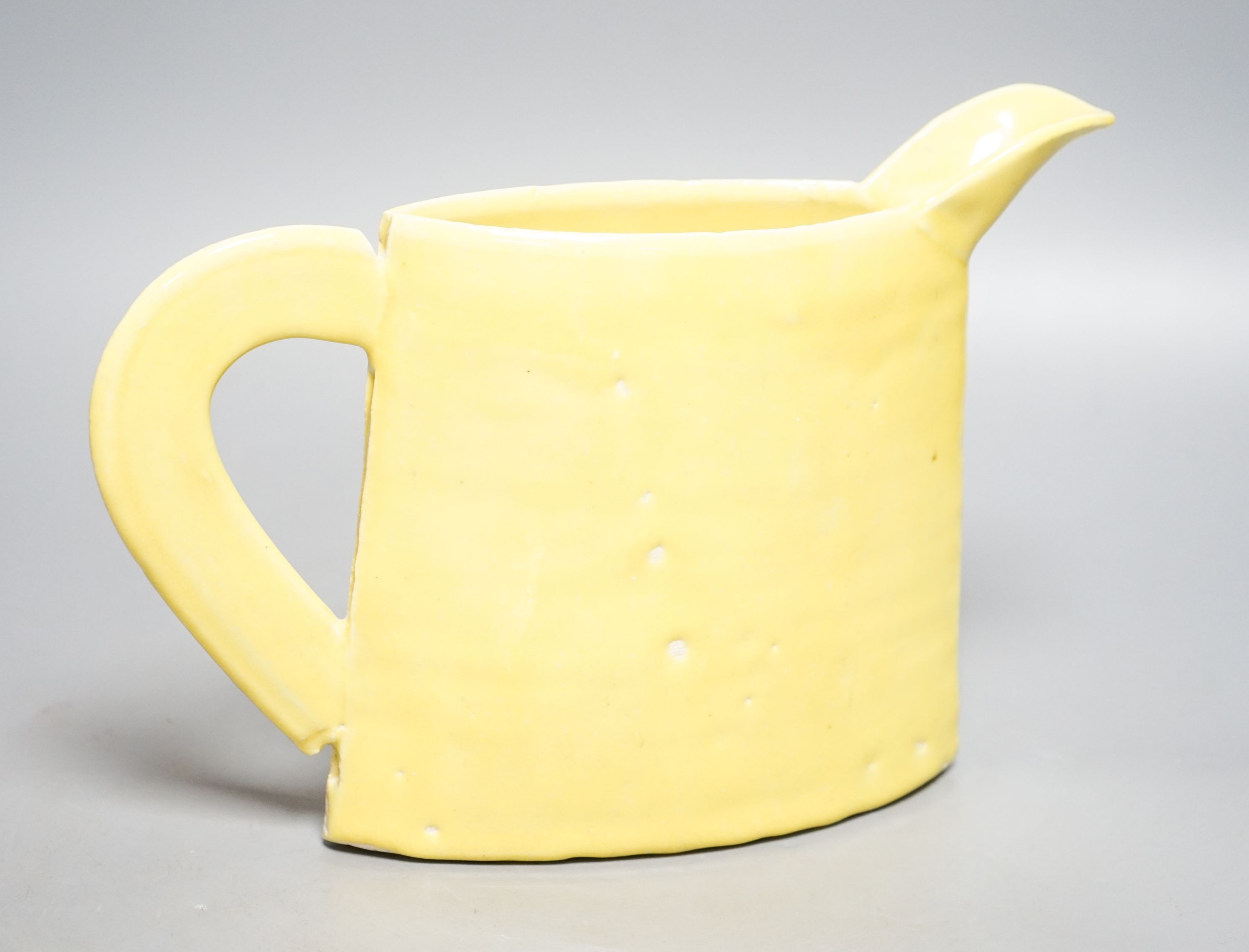 Emmanuel Cooper (1938-2012), a yellow glazed jug 20cm